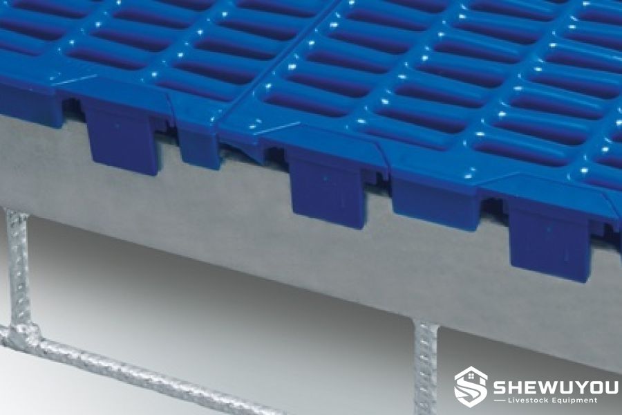 galvanized steel support frame beneath plastic pig slats