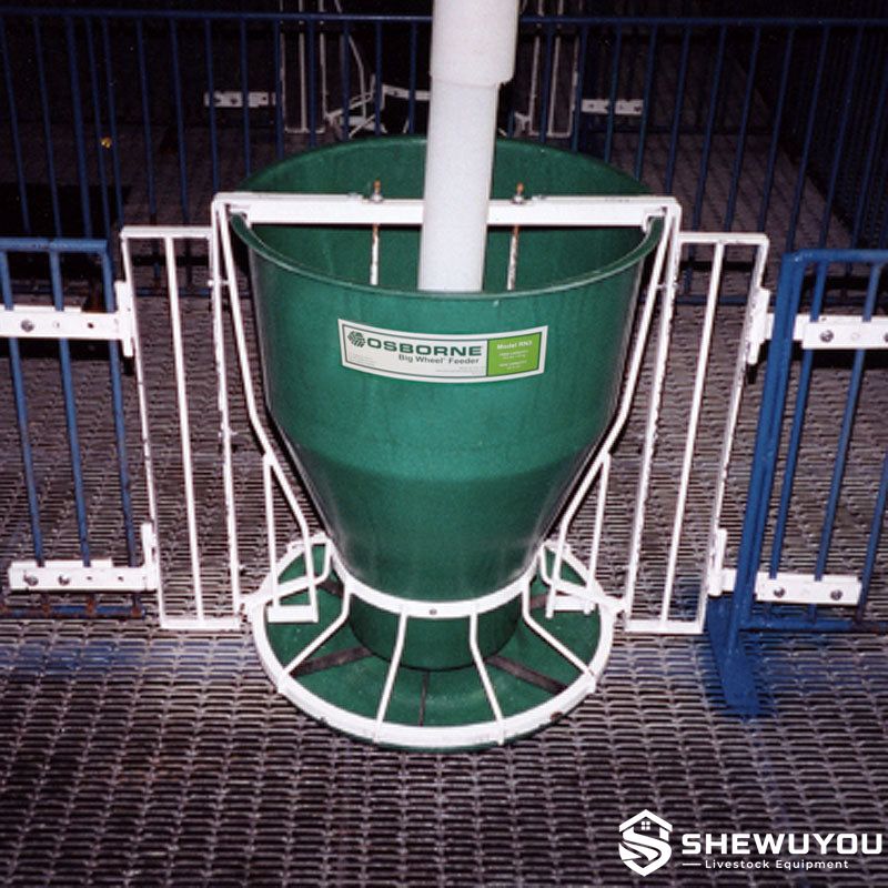 Round Nursery Pig Feeder Fenceline Installation