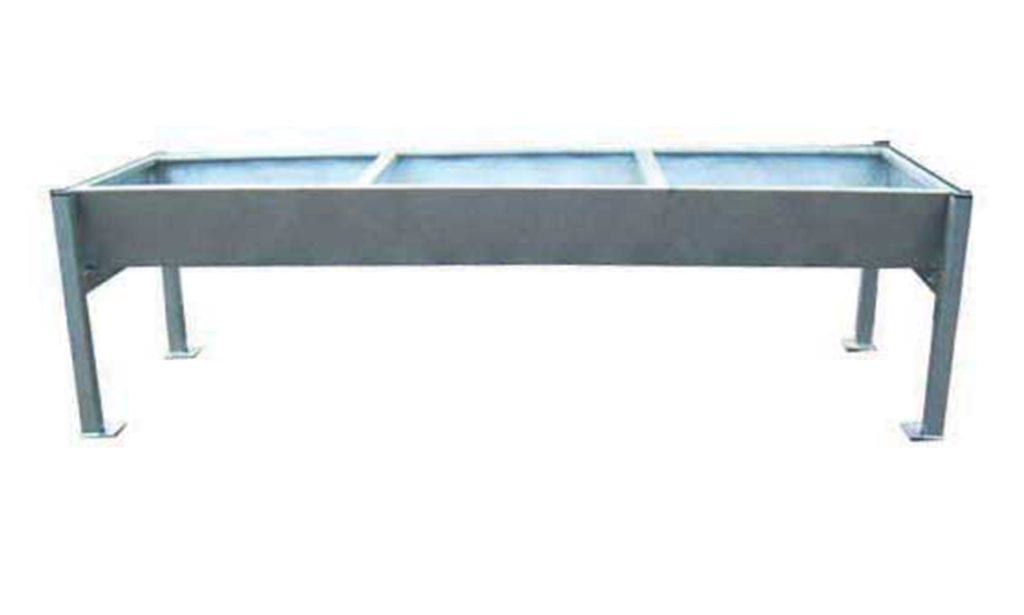 low-level galvanized beef cattle trough on legs