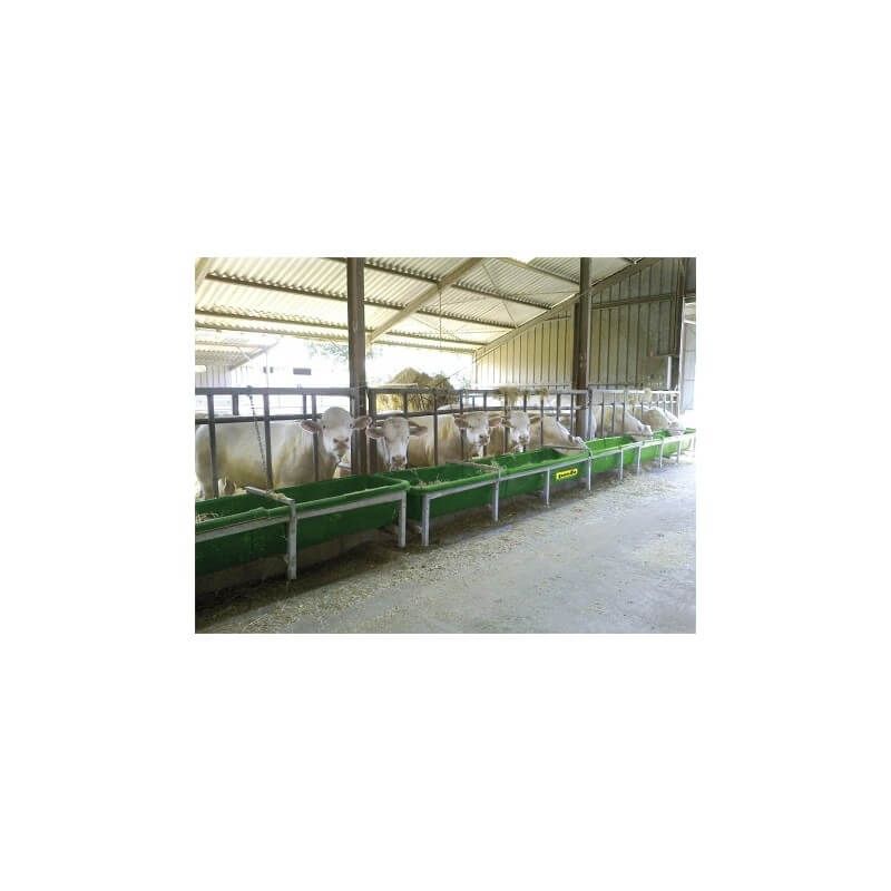 HDPE cattle feed trough installed in livestock barn