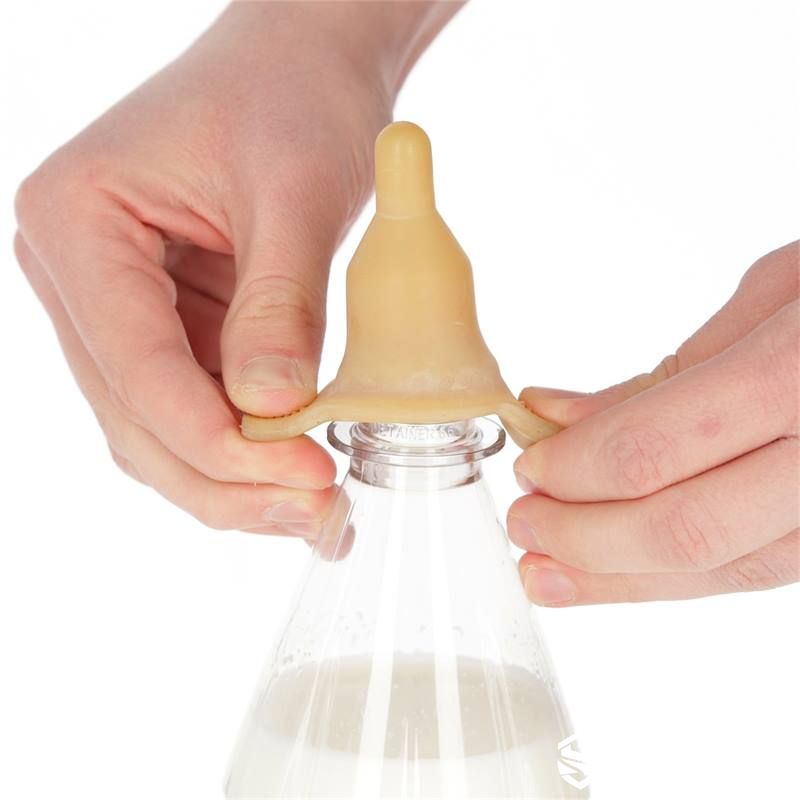 pull-on rubber bottle teat installation with side tabs