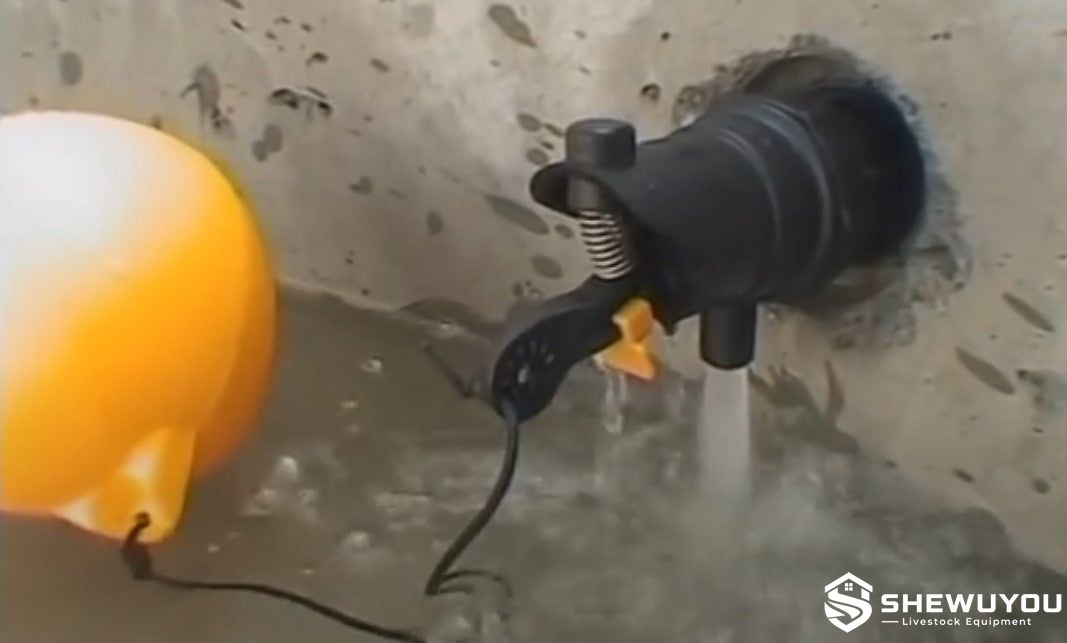 automatic float valve installed in livestock water trough