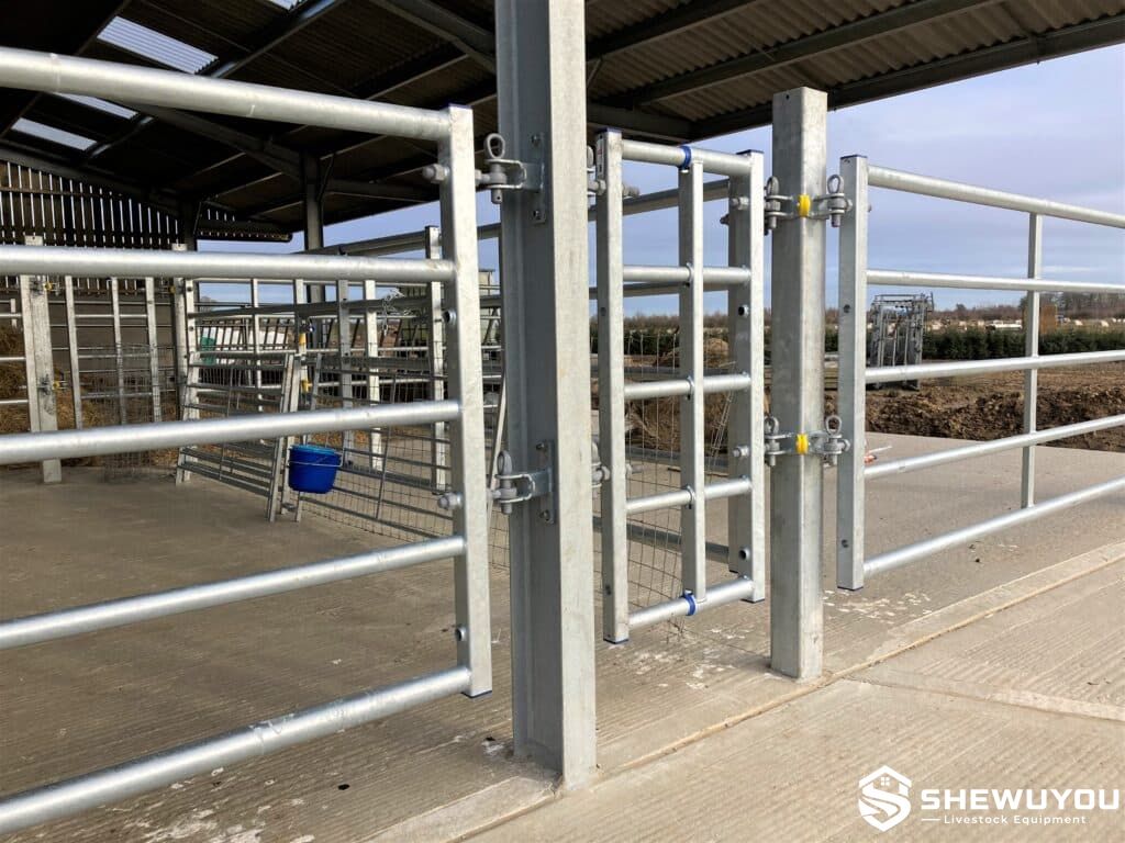 modular cattle housing panels and post brackets installed