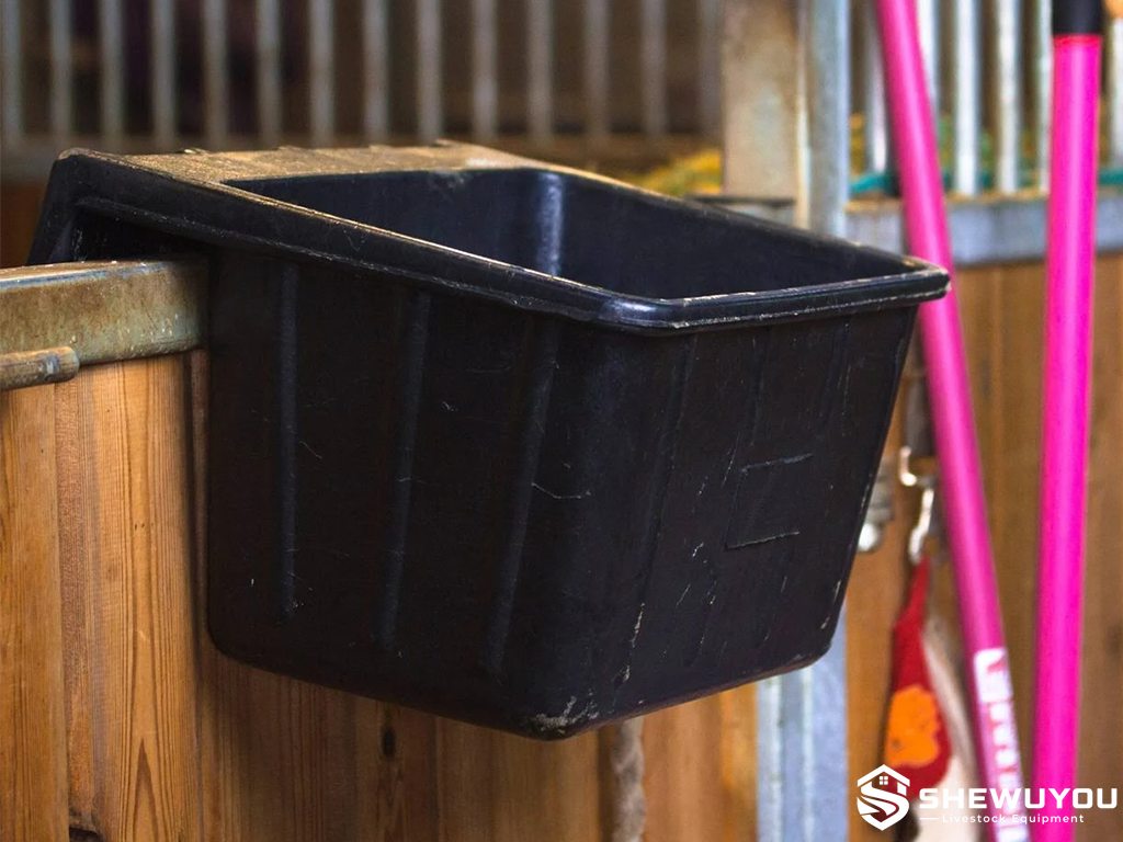 Hanging rubber feed trough livestock equipment