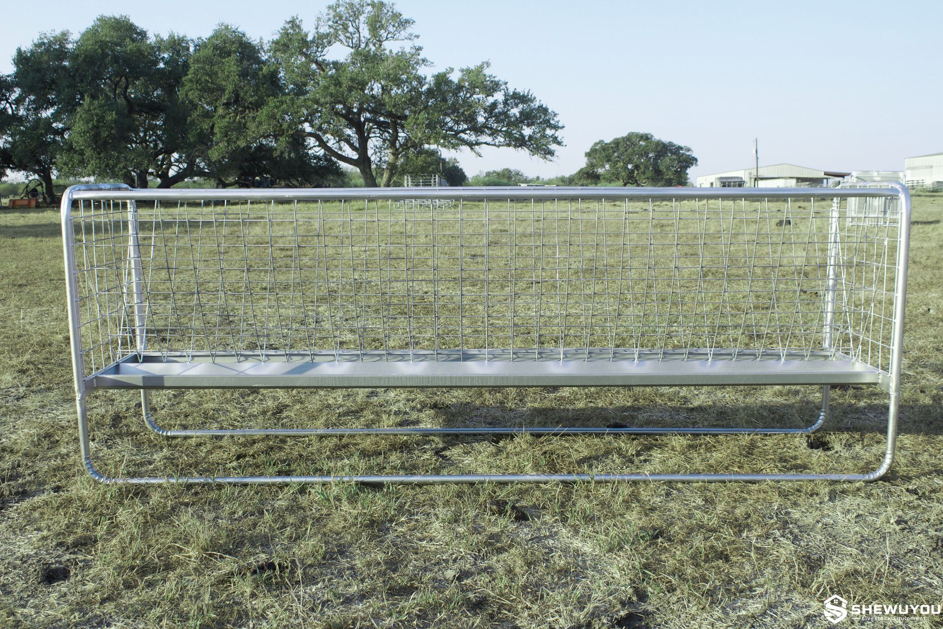 Double sided goat feed trough