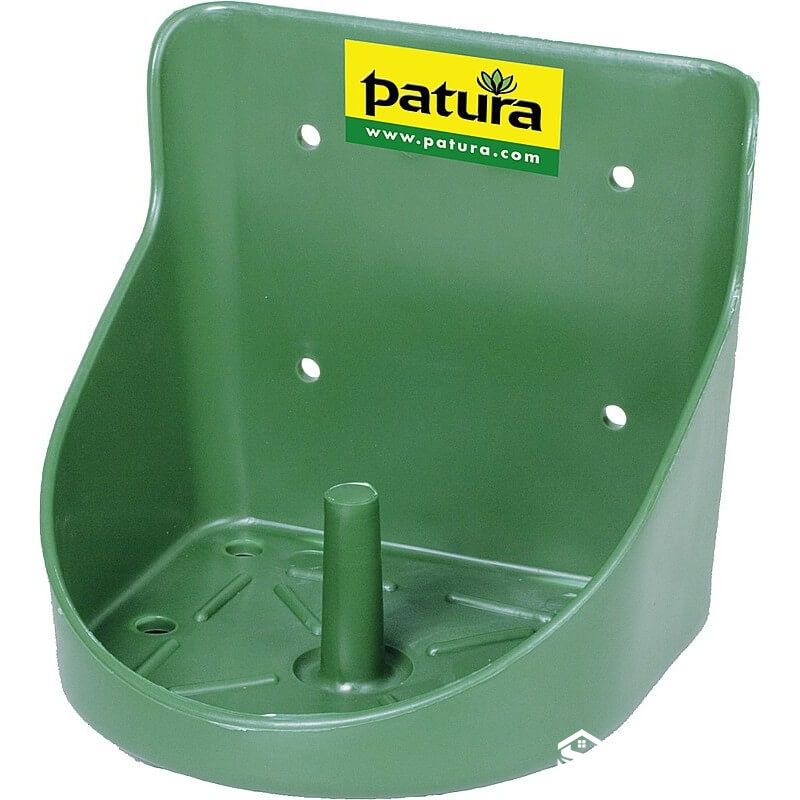 green plastic mineral block holder for cattle and sheep
