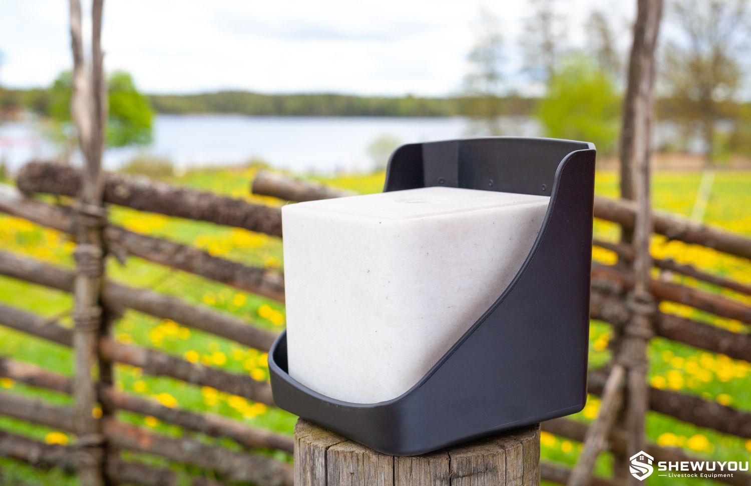 10kg salt lick holder installed on farm post