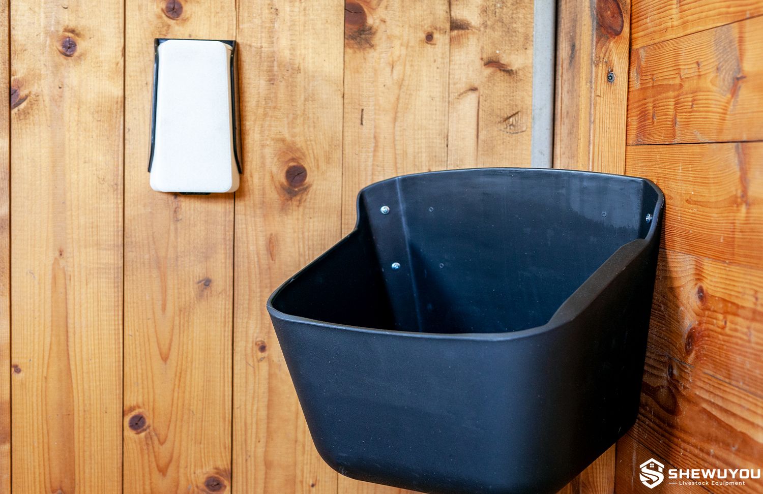 2kg salt lick holder installed in livestock stable