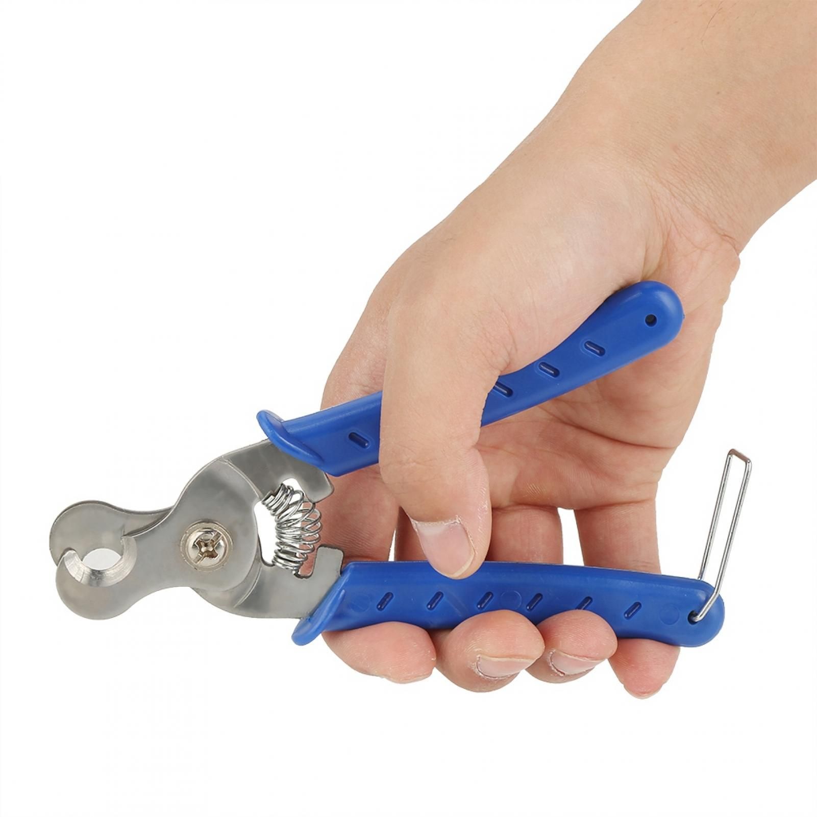 Livestock ear tag removal pliers in use